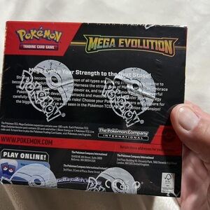 Pokemon Mega Evolution Box with Black and Gold Design
